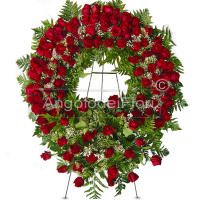 Corona funebre di rose rosse
