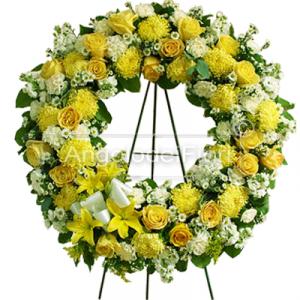 Funeral wreath with yellow and white flowers